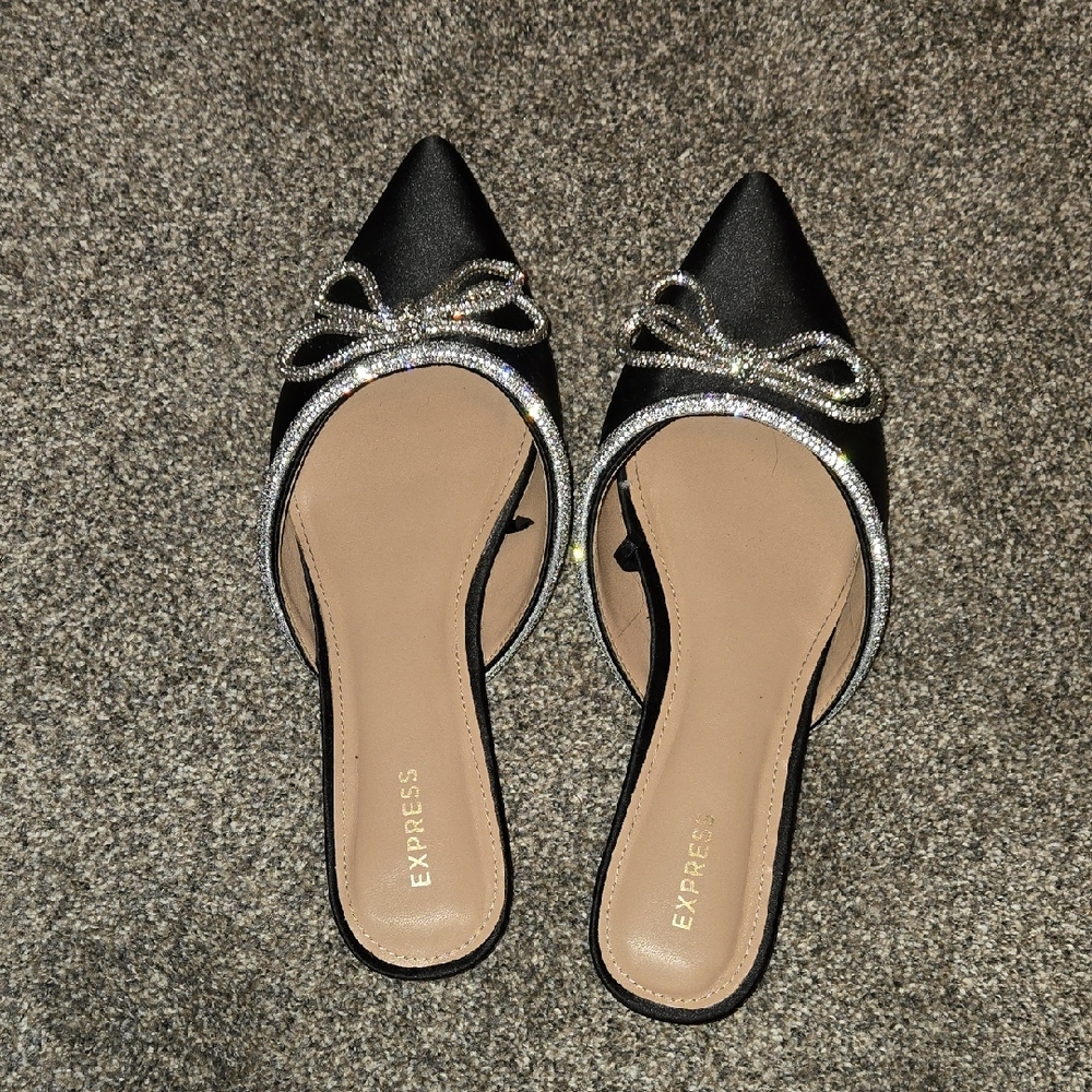 Express Black Mules with Silver Bow Detail